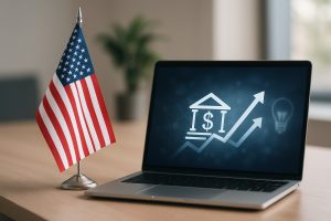 Minimalist and realistic image of a modern workspace with a laptop on a wooden desk displaying abstract financial symbols and upward arrows, next to a small United States flag, representing how fintech innovation is influencing investment decisions and Investments in the U.S. market.